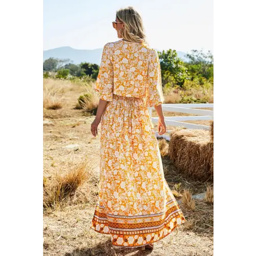 Blossom in Elegance Printed Half Sleeve Top and Slit Skirt Set