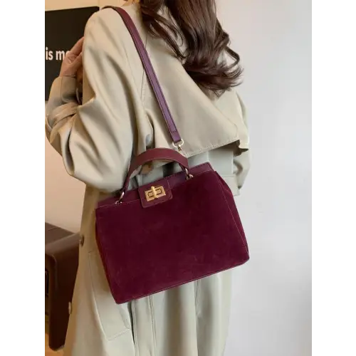 Chic Handbags with Gold Clasps and Removable Straps