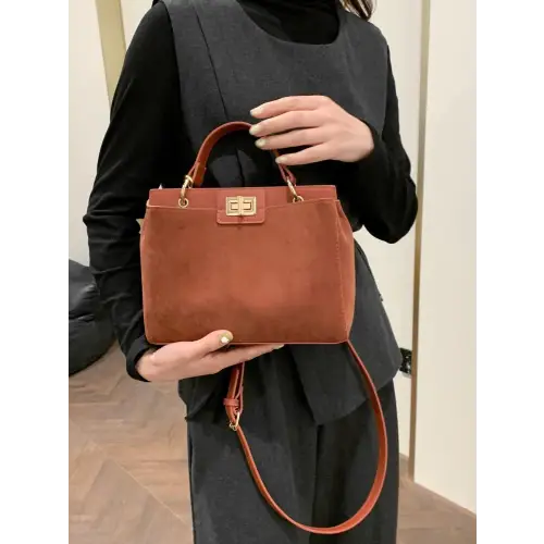 Chic Handbags with Gold Clasps and Removable Straps