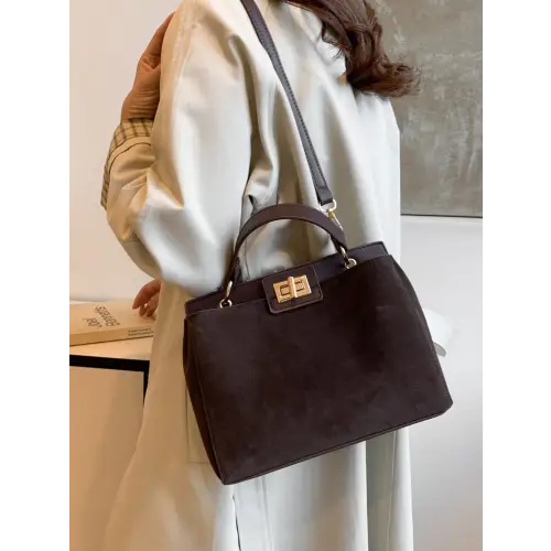 Chic Handbags with Gold Clasps and Removable Straps