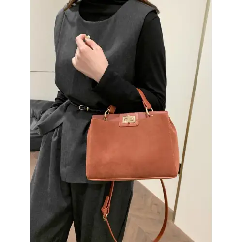 Chic Handbags with Gold Clasps and Removable Straps