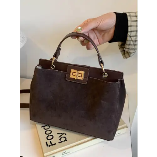 Chic Handbags with Gold Clasps and Removable Straps