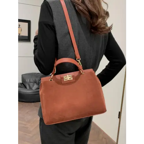 Chic Handbags with Gold Clasps and Removable Straps
