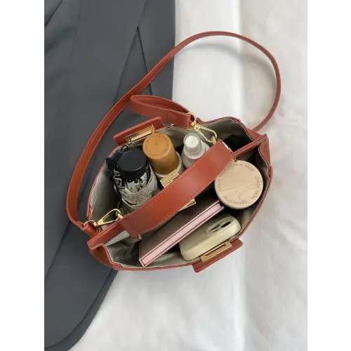 Chic Handbags with Gold Clasps and Removable Straps
