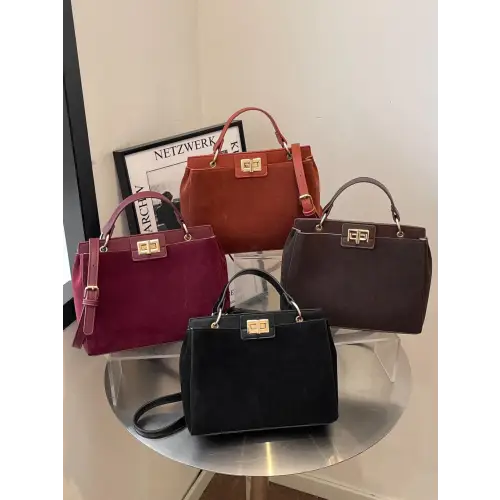 Chic Handbags with Gold Clasps and Removable Straps
