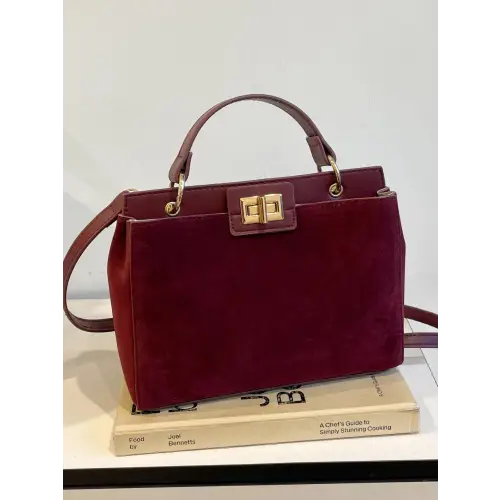 Chic Handbags with Gold Clasps and Removable Straps