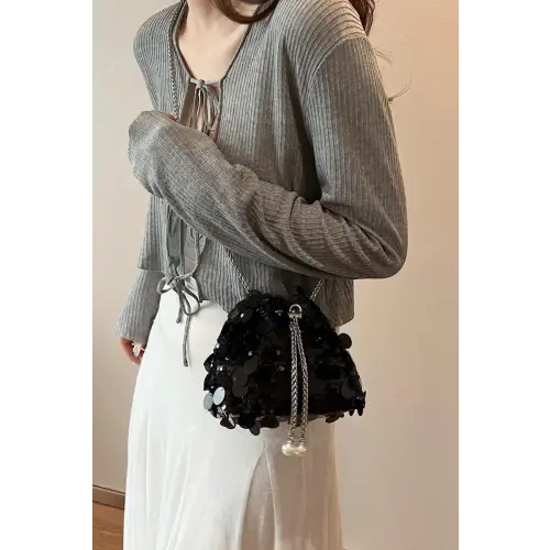 Shimmer in Style with the Drawstring Sequin Crossbody Bag