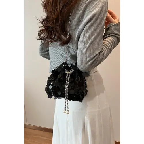 Shimmer in Style with the Drawstring Sequin Crossbody Bag