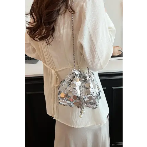 Shimmer in Style with the Drawstring Sequin Crossbody Bag
