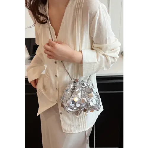 Shimmer in Style with the Drawstring Sequin Crossbody Bag