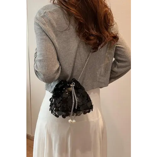 Shimmer in Style with the Drawstring Sequin Crossbody Bag