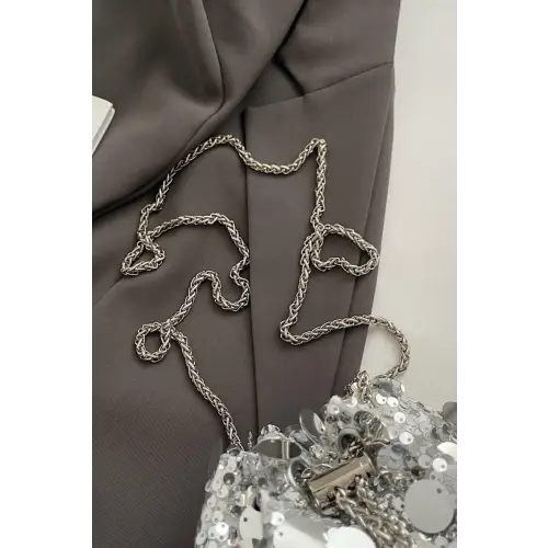 Shimmer in Style with the Drawstring Sequin Crossbody Bag