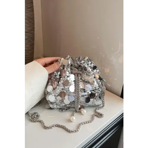 Shimmer in Style with the Drawstring Sequin Crossbody Bag