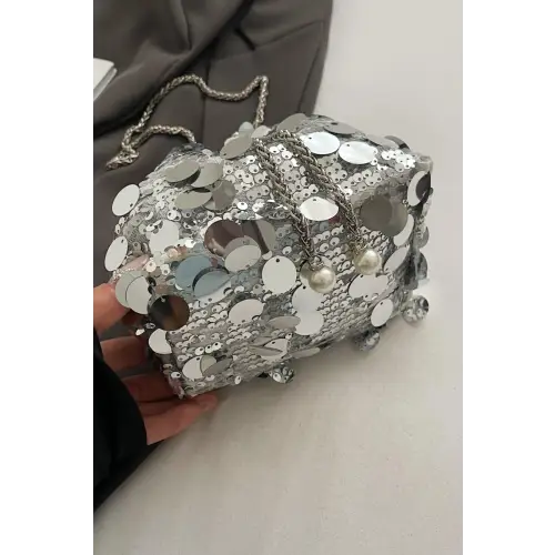 Shimmer in Style with the Drawstring Sequin Crossbody Bag