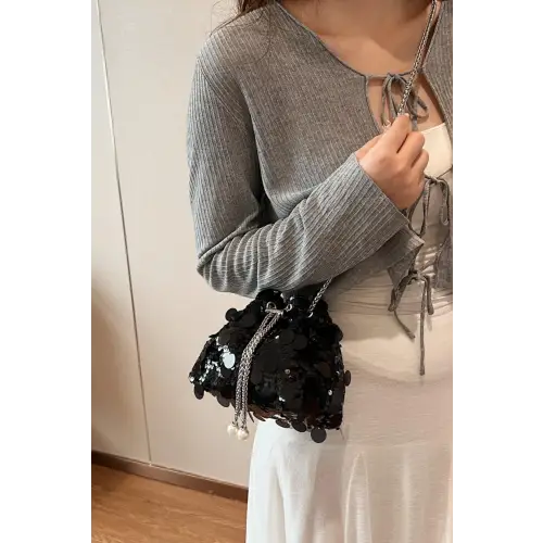 Shimmer in Style with the Drawstring Sequin Crossbody Bag
