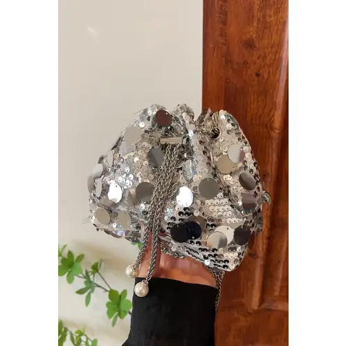 Shimmer in Style with the Drawstring Sequin Crossbody Bag