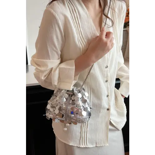 Shimmer in Style with the Drawstring Sequin Crossbody Bag