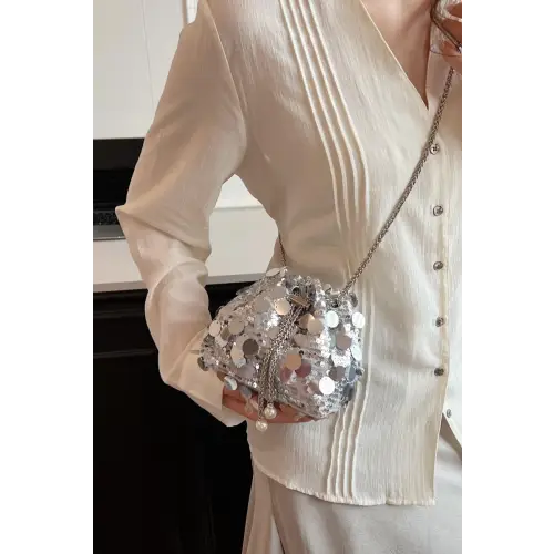 Shimmer in Style with the Drawstring Sequin Crossbody Bag