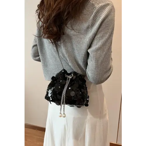 Shimmer in Style with the Drawstring Sequin Crossbody Bag