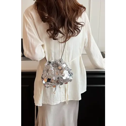 Shimmer in Style with the Drawstring Sequin Crossbody Bag
