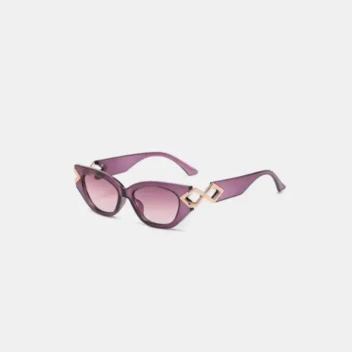 Sleek Black Cat-Eye Sunglasses with Gold Accents in Polycarbonate Frame
