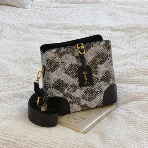 Sleek Leather Snakeskin Print Crossbody Bucket Bag