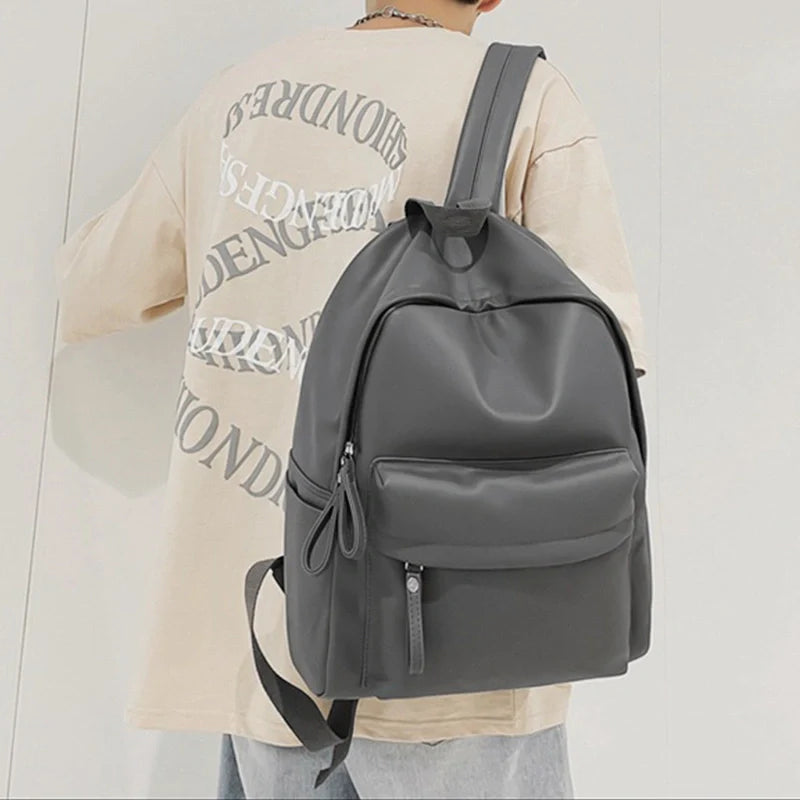 Sleek Leather Zip Backpack