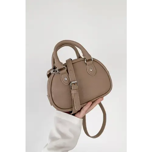 Stunning Gold Dome Leather Handbag Elevates Your Style