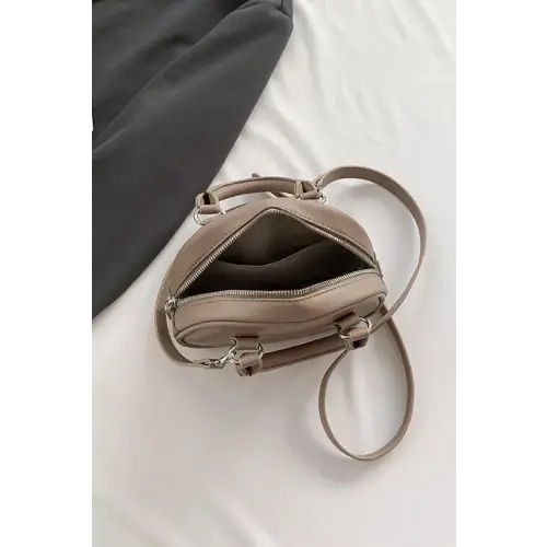 Stunning Gold Dome Leather Handbag Elevates Your Style