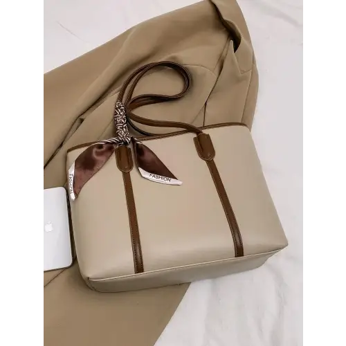 Stylish Black Leather Tote Bag with Elegant Scarf Accent