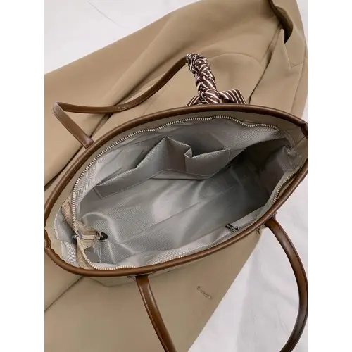 Stylish Black Leather Tote Bag with Elegant Scarf Accent