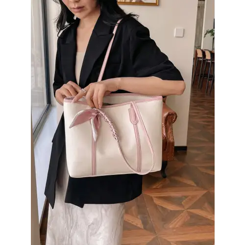 Stylish Black Leather Tote Bag with Elegant Scarf Accent