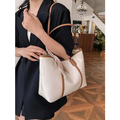 Stylish Black Leather Tote Bag with Elegant Scarf Accent