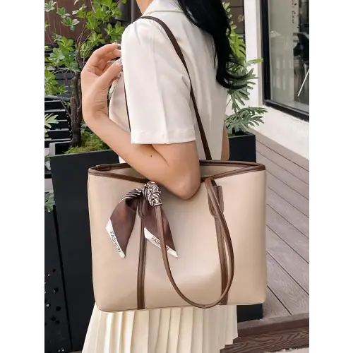 Stylish Black Leather Tote Bag with Elegant Scarf Accent