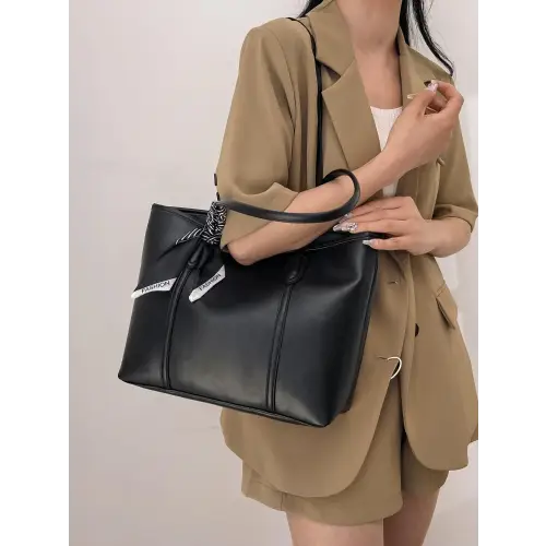 Stylish Black Leather Tote Bag with Elegant Scarf Accent