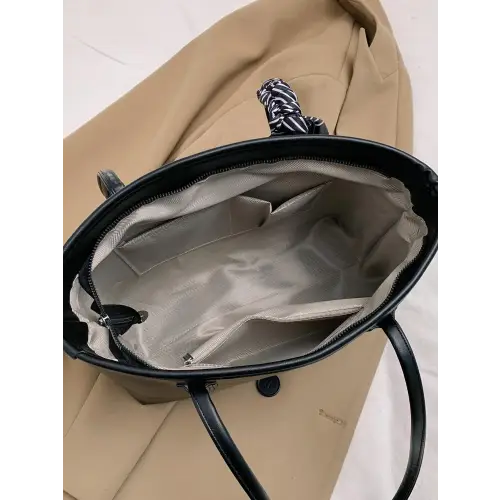 Stylish Black Leather Tote Bag with Elegant Scarf Accent