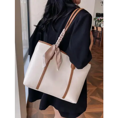 Stylish Black Leather Tote Bag with Elegant Scarf Accent