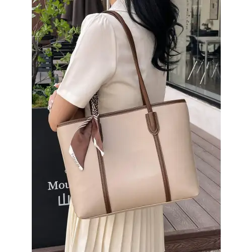 Stylish Black Leather Tote Bag with Elegant Scarf Accent