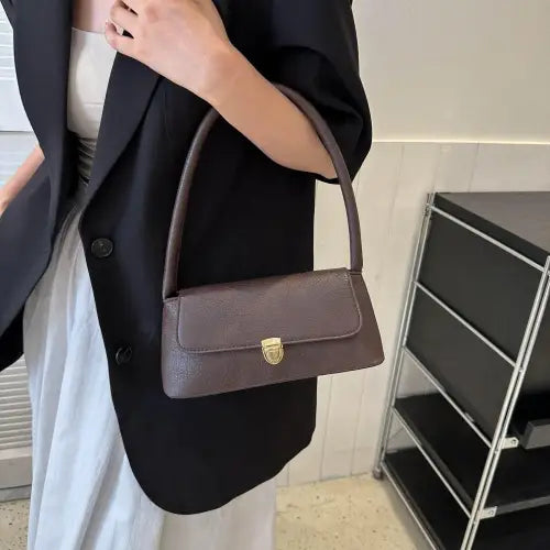 Stylish Brown Leather Shoulder Bag with Elegant Gold Clasp