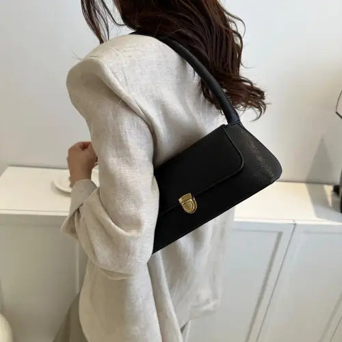 Stylish Brown Leather Shoulder Bag with Elegant Gold Clasp